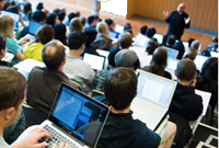 students at class with laptops