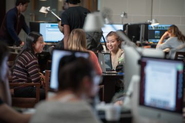 students working on computer